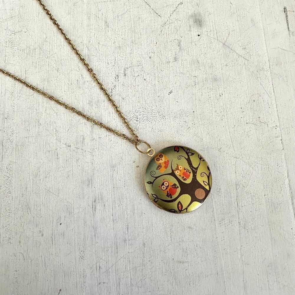 Gold tone owl locket necklace